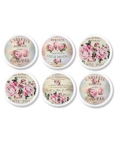 six soaps with pink roses on them are shown in the shape of coasters