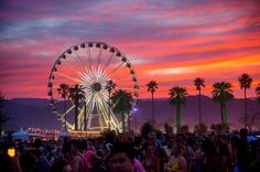 people are standing in front of a ferris wheel at sunset with the words nyx professional makeup