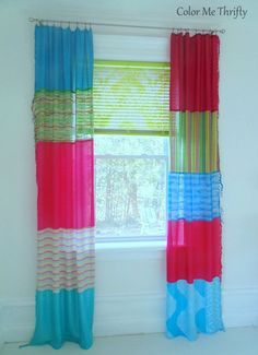 a window with colorful curtains in it