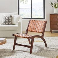 a living room filled with furniture and a large window