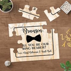 a wooden puzzle with the words brans all you be our ring bearer