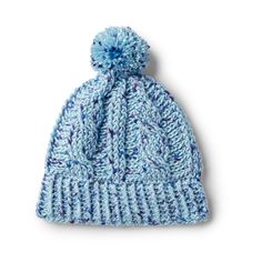 a blue knitted hat with a pom - pom