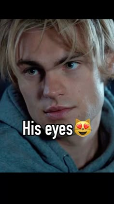 a man with blonde hair wearing a hoodie and the words his eyes on it