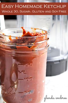 a mason jar filled with homemade ketchup