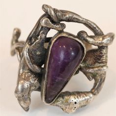 Brutalist Hand Crafted Ring, Modernist Organic Setting, Triangular Cabochon Amethyst Measuring 7 Mm X 16mm, Size 5.25; [.36 Ozt Total]; Some Patina On Silver Inside And Stone Outside. Stone Is Solid Modernist Hand-cast Sterling Silver Jewelry, Unique Hallmarked Sterling Silver Amethyst Ring, Unique Hallmarked Amethyst Ring In Sterling Silver, Brutalist Ring, Womens Jewelry Rings, Sterling Silver Ring, Silver Ring, Sterling Silver Rings, Patina