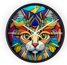 a clock with an image of a cat's face on the front and sides