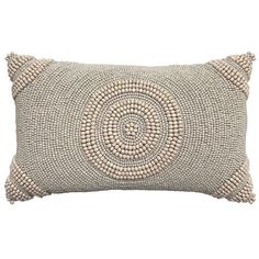 a decorative pillow with beads on it