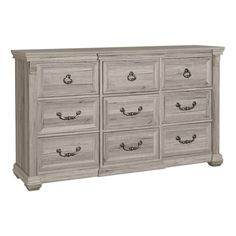 a white dresser with many drawers and handles