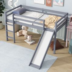 a child's bunk bed with a slide on the bottom