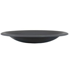 a black plate sitting on top of a white table