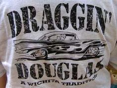 a man wearing a draggin'douglas t - shirt with a car on it