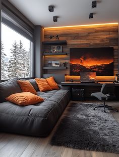 a living room filled with furniture and a flat screen tv mounted to the side of a wall