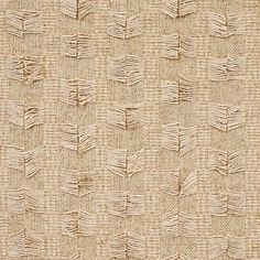 an upholstered textured wallpaper pattern in beige