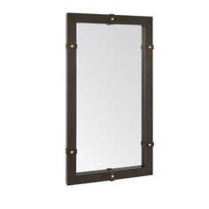 a mirror that is hanging on the wall