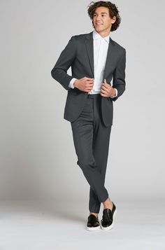 SuitShop Teen suiting offers the perfect blend of style and sophistication tailored specifically for teens that are between the youth and adult sizes that need something to fit that specific age range (typically ages 12-14). Whether it's a formal event, a special occasion, or a school function, your teen will stand out in confidence and charm with this impeccably designed suit. We understand the importance of comfort for active teenagers, which is why our suit is crafted with high-quality materi Slim Fit Suits With Welt Pockets And Suit Collar, Semi-formal Suit With Welt Pockets, Semi-formal Suit With Welt Pockets And Suit Collar, Tailored Single Button Suit, Tailored Single-button Suit In Suiting Fabric, Classic Long Sleeve Suits In Suiting Fabric, Professional Single Breasted Suiting Fabric Sets, Professional Single-breasted Suiting Fabric Set, Semi-formal Long Sleeve Suiting Fabric Set