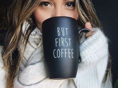 a woman holding a coffee mug with the words, but first coffee everything you need to know about coffee