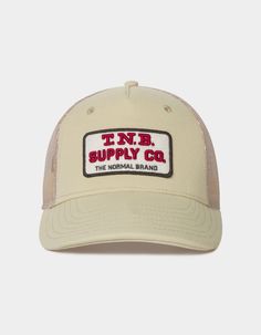 Channel some of your inner-country with this general store-inspired hat. The graphics are double-felt and embroidery for just a touch of vintaged texture. Our high-profile hats fit deep, and adjust with a snap closure to fit any head. High-Profile 5 Panel fit Deep fitting 88% Acrylic / 10% Wool / 2% Spandex front 100% Polyester mesh back Double layer embroidered felt Plastic snap back closure Beige Trucker Hat With Curved Brim For Outdoor, Vintage Cotton Trucker Hat With Curved Bill, Vintage Trucker Hat With Logo Patch And Curved Bill, Trucker Snapback Hat With Embroidered Logo And Curved Brim, Beige Flat Bill Trucker Hat For Outdoor, Vintage Trucker Hat With Logo Patch And Flat Brim, Vintage Trucker Hat With Logo Patch, Vintage 5-panel Trucker Hat With Logo Patch, Trucker Hat With Curved Brim And Logo Patch