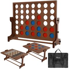 the giant four in a row game set includes two tables and a carry - on bag