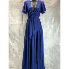 Lauren Ralph Lauren Women's Navy V-Neck Faux-Wrap Flutter Sleeve Georgette Evening Maxi Gown Sz 6 Crossover Neckline Flutter Sleeves Pleated Gathering At Waist Threaded Belt Loops; Self-Tie Waist Sash Diagonal Skirt Seam Concealed Side-Seam Zipper With Hook-And-Eye Closure Lined Imported 100% Polyester Dry Clean This Is A Preowned Item In Good Condition. There Are Signs Of Wear. Please Refer To Images. Approx. Measurements: * Waist: 13" * Length: 63" * Chest: 15.5" * Sleeves: 8" * Hip: 18" Retai Blue V-neck Maxi Dress With Ruffle Hem, Ralph Lauren V-neck Evening Dress, Ralph Lauren Summer V-neck Dress, Denim Blue V-neck Dress With Button Closure, Blue Rayon V-neck Maxi Dress, Waist Sash, Maxi Gown, Ralph Lauren Womens, Maxi Gowns