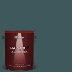 behr marquee interior paint in one gallon, with the light shining on it