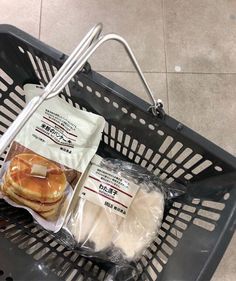 a basket filled with lots of food on top of a floor