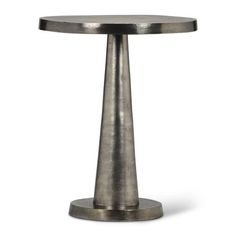 a round metal table with an iron base on a white background for use as a centerpiece