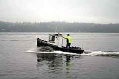 a man on a boat in the water