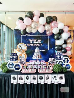 a star wars themed party with balloons and decorations