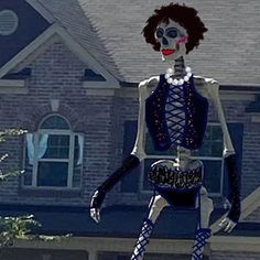 a skeleton is standing in front of a house