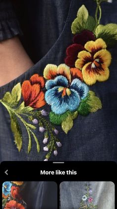 the back of a woman's shirt with flowers embroidered on it and text that reads, more like this