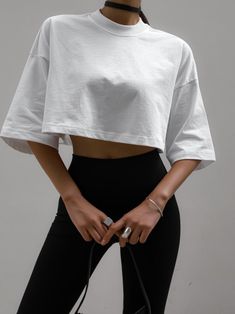 Short cropped style basic t-shirt with half sleeve and crewneck style. Model is wearing a MINUSEY ONE SIZE. ✔️ Free worldwide express shipping over $100✔️ Loved by 6,500+ customers✔️ Limited edition collections, maximum style⠀⠀⠀⠀⠀⠀⠀⠀⠀Stay ahead of the trend with can’t-find-anywhere-else staples. Your closet will thank you 💕 * MINUSEY ONE SIZE = EU 34-38, US 2-6* 100% Cotton* Dry clean* Made in Korea - Model Height: 173cm/5'8" (US4, EU36) Cropped Tshirt Outfits, Oversized Crop Top Outfit, Cropped Oversized Tshirt, Oversized Cropped Tshirt, Blusas Crop Top, 18th Birthday Outfit, Oversize Tshirt Outfits, Oversize Outfit, Oversized Crop Top