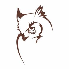 an owl's face is drawn in brown ink