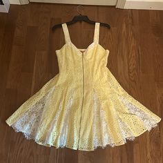 Nwt Vintage Betsey Johnson Yellow Lace Corset Flare Dress Size 6 In Perfect Condition. No Stains, Tears, Piling, Fading, Or Any Significant Wear Whatsoever. A Truly Rare Find! 100% Authentic. Corset Style Top. Zipper Closure. Zipper Is Fully In Tact. White Lace Embellishments. Yellow/White Eyelet Fabric. Fully Lined. Length: 28.5” Bust: 16-16.5” Waist: 28” Smoke And Pet Free Home. Contact Me For Any Questions Regarding This Item For Sale. Buyers Who Purchase 2 Or More Items From My Closet Will R Yellow A-line Lined Dress, Yellow Lined Sundress, Fitted Yellow Sundress, Yellow Fitted Sundress, Yellow Lace Sleeveless Dress, Yellow Lace Mini Dress For Summer, Yellow Fitted Dress With Lace Trim, Yellow Lace Mini Dress, Betsey Johnson 70s