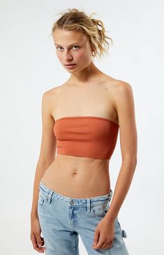 The Seamless Tube Top from Contour features a sleek, strapless design crafted from luxurious seamless ribbed fabric for ultimate comfort and style. Its cropped length makes it perfect for pairing with high-waisted jeans or skirts, adding a chic touch to any outfit.


	Seamless ribbed fabric
	Good stretch
	Straight neckline
	Strapless
	Cropped length
	Fitted
	94% polyamide, 6% elastane
	Machine washable
	Model is wearing a size small Stretch Cropped Tube Top, Bra Friendly, Bra Friendly Cropped Stretch Tube Top, Stretch Cropped Tube Top Bra Friendly, Casual Seamless Cropped Tube Top, Casual Cropped Seamless Tube Top, Seamless Bandeau Crop Top, Seamless Strapless Crop Top, Trendy Seamless Bandeau Tube Top, Strapless Seamless Crop Top