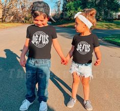 Raise a child that knows God loves them when they wear this Christian t-shirt! Represent God's love with this kid's Christian t-shirt.    Q U I C K * F A C T S * ✺ 100% Airlume combed and ringspun cotton (fiber content may vary for different colors) ✺Extra light fabric (3.9 oz/yd² (132 g/m ✺Tear-away label    S I Z I N G * ✺ Sizing is unisex so runs like men's,loose fit. ✺ We recommend selecting an item from your closet that fits well and comparing the item's measurements to the numbers above to Kids Christian Shirts, Christian Kids Shirts, Christian Graphic Tees, Christian Shirts Designs, Christian Kids, Jesus Shirt, Christian Apparel, Christian Shirt, Jesus Shirts