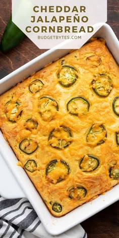 cheddar jalapeno cornbread casserole in a white dish