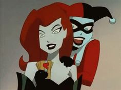 an animated image of two people dressed as harley and catwoman, one with red hair