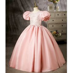 Discover the perfect blend of elegance and charm with our Pink Princess Scoop Floor Length Satin Flower Girl Dress. Made with luxurious satin fabric and embellished with exquisite beading and sequins, this dress is perfect for all special occasions. The puff sleeves and crossed back straps add delicate details to the flattering silhouette, making your little princess stand out on her big day. Rose Bonbon, Princess Coloring, Satin Flowers, Pink Princess, Flower Girl Dress, Pink Candy, Pink Fabric