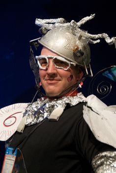 a man wearing a silver helmet and some tinfoil