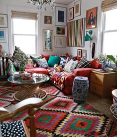 a living room filled with lots of colorful furniture