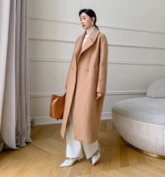 "Casual design style , long, oversized double- side handmade wool coat with viscose lining, The only coat you'll need come fall and winter, wool coat features a boxy silhouette, oversized lapels, and roomy sleeves. Crafted from 30% wool, it's designed to keep you warm and comfortable through colder seasons. Very suitable for your daily wear, party, travel, work, school, indoors and outdoor walks, spending time with family, shopping, etc. It is very comfortable and beautiful to wear The coat has Oversized Long Wool Coat For Work, Oversized Long Outerwear For Work, Long Wool Coat For Office, Long Beige Wool Coat For Work, Beige Long Wool Coat For Workwear, Long Pea Coat For Workwear, Oversized Long Wool Coat Single Breasted, Beige Oversized Wool Coat With Lapel Collar, Oversized Long Sleeve Wool Coat For Office