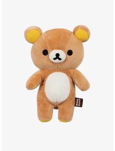 a brown and white teddy bear with black eyes