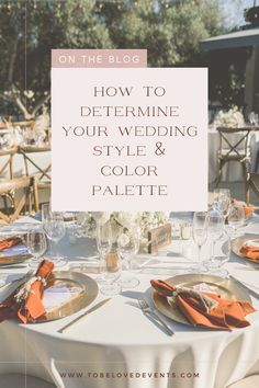 a table set up for a wedding with orange napkins and place settings on it