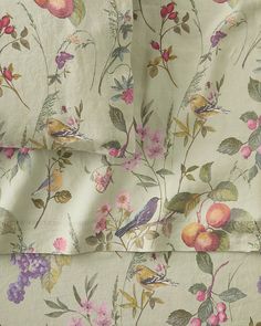 an image of a flowered fabric with birds and flowers on it's side