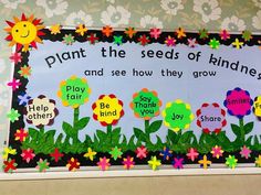 a bulletin board with flowers and plants on it that says plant the seeds of kindness