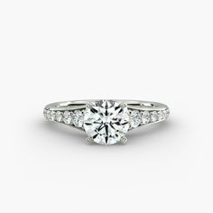 a round brilliant cut diamond engagement ring