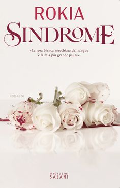 the cover of roka sindrome, with white roses in front of it