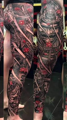 the legs are covered in black and grey tattoos, with red flowers on each leg