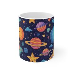 a coffee mug with planets and stars on it