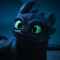 a close up of a toothless dragon with glowing green eyes and black hair, looking at the camera